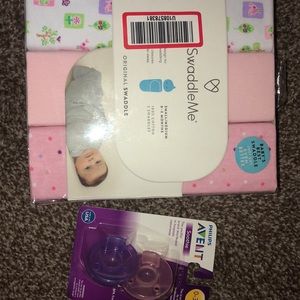 swaddles and pacifiers